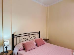 Ένα ή περισσότερα κρεβάτια σε δωμάτιο στο GnA Place - Stylish and Cozy Apartment in the Heart of the City By Villa Mana Gers