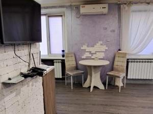 Η κουζίνα ή μικρή κουζίνα στο Студия в центре города