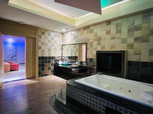Fotografie z fotogalerie ubytování Wei Feng Exquisite Motel Pintung Branch v destinaci Pching-tung + 37 fotografií