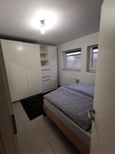 En eller flere senge i et værelse på Dürr