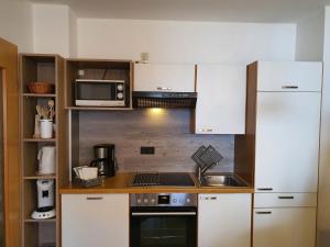 Кухня или мини-кухня в Himmelsschlüssel -210-
