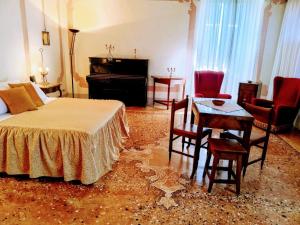 Postel nebo postele na pokoji v ubytování Villa De Rubeis Florit