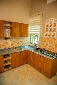 Φωτογραφία από το άλμπουμ του Kush homes στην Καμπάλα
