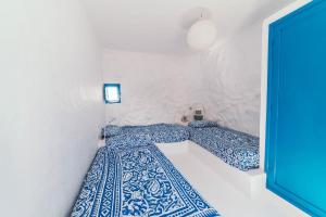 Posteľ alebo postele v izbe v ubytovaní Seaside Villa La Graciosa + 37 fotografií