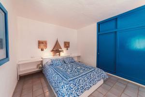 Posteľ alebo postele v izbe v ubytovaní Seaside Villa La Graciosa