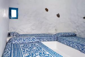 Posteľ alebo postele v izbe v ubytovaní Seaside Villa La Graciosa