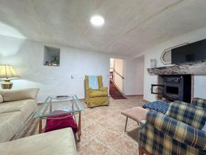 TV a/nebo společenská místnost v ubytování Casa cueva rural Vico, ideal grandes grupos