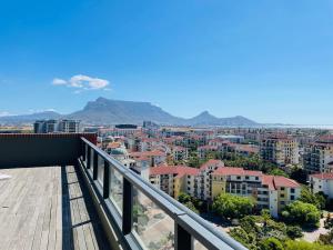 a view of a city from a balcony at Studio in the City in Cape Town