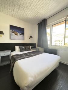 Voodi või voodid majutusasutuse Hotel Panda toas