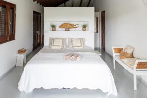 Ένα ή περισσότερα κρεβάτια σε δωμάτιο στο Watervilla Blou Bonaire - Waterlands Village +56 φωτογραφίες