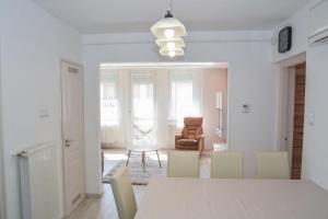 Posedenie v ubytovaní Helga apartman