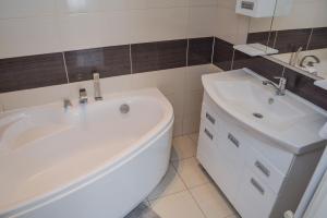 Kúpeľňa v ubytovaní Helga apartman