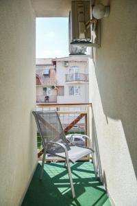 Balkón alebo terasa v ubytovaní Helga apartman