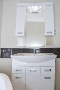 Kúpeľňa v ubytovaní Helga apartman