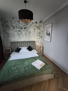 Łóżko lub łóżka w pokoju w obiekcie Tabago Studio 4 Katowice Superjednostka