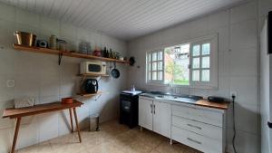 Afbeelding uit fotogalerij van Casa das Plantas in Gravatal