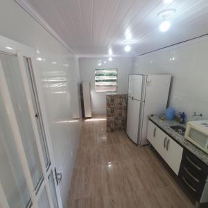 Η κουζίνα ή μικρή κουζίνα στο Pousada Sitio Ceu de Estrelas, Paraiso Cinematográfico!!