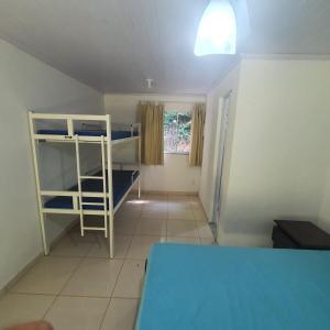 Ένα ή περισσότερα κρεβάτια σε δωμάτιο στο Pousada Sitio Ceu de Estrelas, Paraiso Cinematográfico!! +15 φωτογραφίες