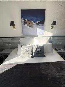 Voodi või voodid majutusasutuse Hotel Panda toas