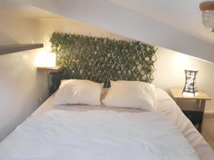 Posteľ alebo postele v izbe v ubytovaní Charmant appartement avec loggia à Saint-Hilaire-de-Riez - 18 m²