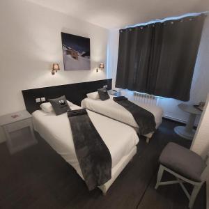Voodi või voodid majutusasutuse Hotel Panda toas