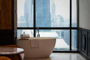 Istumisnurk majutusasutuses The Orient Jakarta, a Royal Hideaway Hotel
