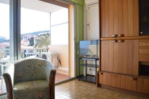 TV a/nebo společenská místnost v ubytování Appart 2 pièces - cabine 6 couchages BANYULS SUR MER BN130-B41