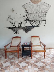 Posezení v ubytování New Toropi Homestay