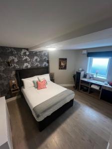 Voodi või voodid majutusasutuse Codladh Sámh Guest House toas