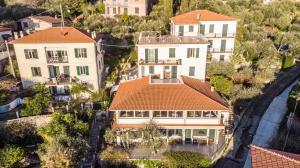 an aerial view of a house in a city at Miramaretellaro in Tellaro +29 photos