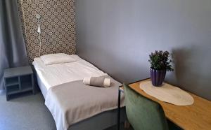 A bed or beds in a room at Tuhamäe Hostel