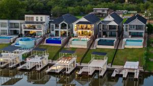 an aerial view of a house on the water at The Enclave New Listing Concierge Services in Kingsland +42 photos