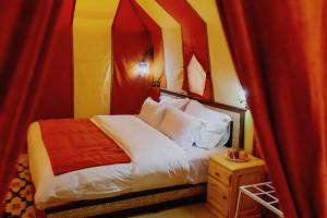 Postel nebo postele na pokoji v ubytování Top Luxury Camp