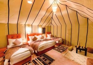 Postel nebo postele na pokoji v ubytování Top Luxury Camp