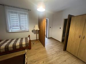 Postel nebo postele na pokoji v ubytování Gospodarstwo Agroturystyczne Bór