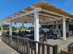 Restaurace v ubytování Happy Camp Mobile Homes in S'Ena Arrubia Camping Village