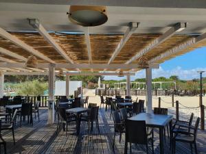 Restaurace v ubytování Happy Camp Mobile Homes in S'Ena Arrubia Camping Village