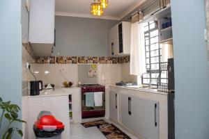 Kuchyň nebo kuchyňský kout v ubytování CRYSTAL HOMES By CHEMA