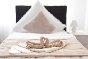 Ένα ή περισσότερα κρεβάτια σε δωμάτιο στο Lemsdorfer Apartments Magdeburg