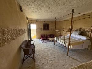 Ένα ή περισσότερα κρεβάτια σε δωμάτιο στο Siwa Tarriott eco lodge hotel +39 φωτογραφίες