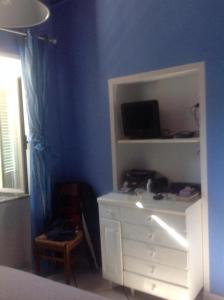 TV a/nebo společenská místnost v ubytování La casina di Silverio + 4 fotografie