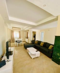 a living room with a couch and a table at Villa 6 in Hurghada