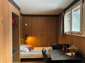 A bed or beds in a room at Hotel Hornerpub