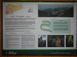 a sign with a picture of a mountain at Albergue Montes de Anaga in El Bailadero