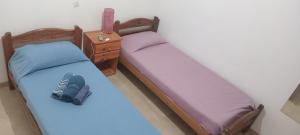 Ένα ή περισσότερα κρεβάτια σε δωμάτιο στο Alojamiento viajeros