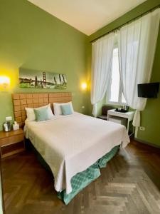 Posteľ alebo postele v izbe v ubytovaní Guest House Meret
