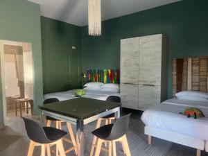 Postel nebo postele na pokoji v ubytování Hôtel Ascosa Aventure