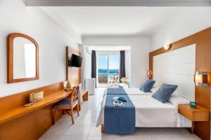 Postel nebo postele na pokoji v ubytování Hotel Vibra Vila