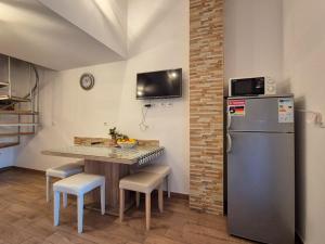 Kuchyň nebo kuchyňský kout v ubytování Apartman Meghan