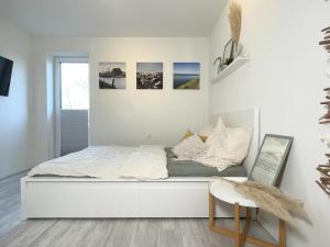 Ένα ή περισσότερα κρεβάτια σε δωμάτιο στο Sielhuus 3